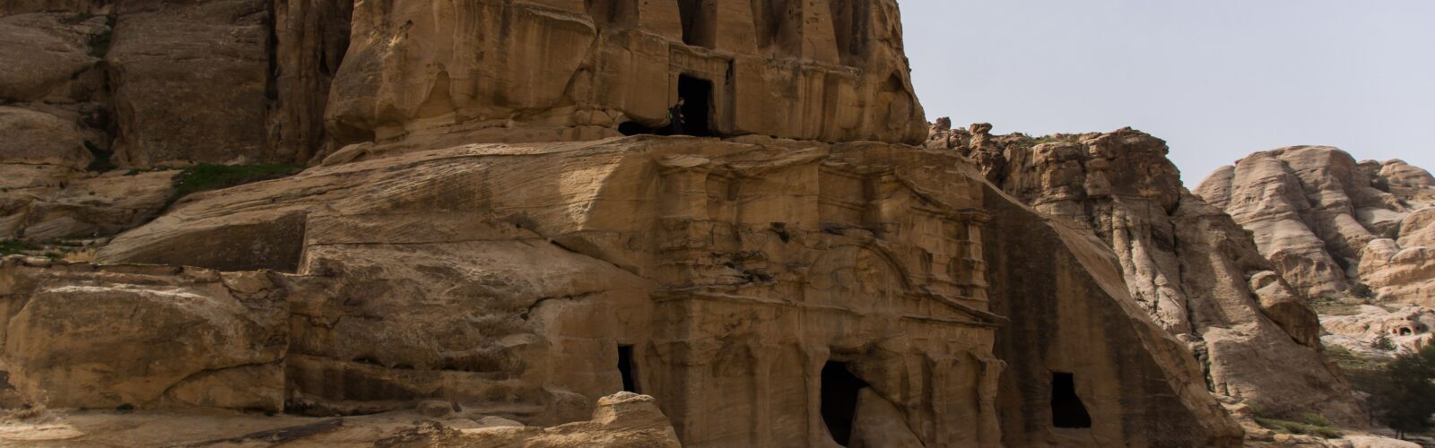A building carved into rock in Jordan.